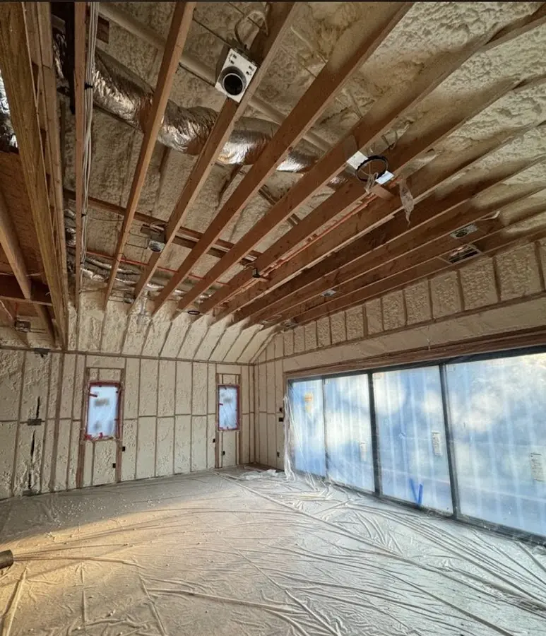 Interior walls and ceiling insulated with spray foam during new construction in McHenry