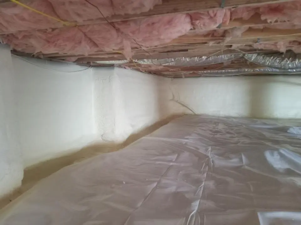Crawl space encapsulation with closed-cell spray foam for Storm Damage Roof Repair in McHenry